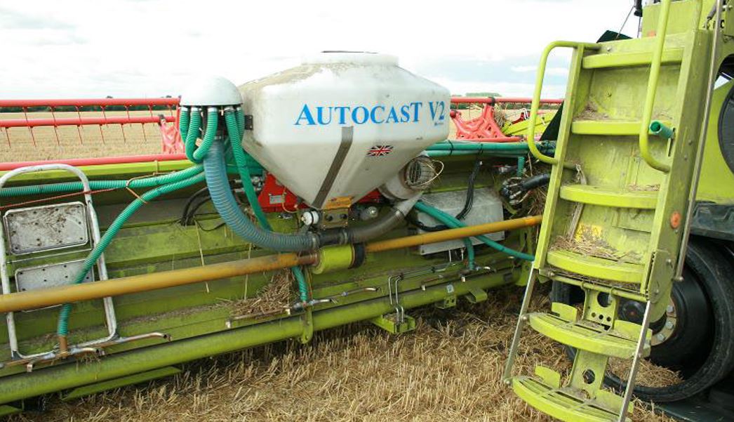 An autocast fitted to a combine to broadcast seeds